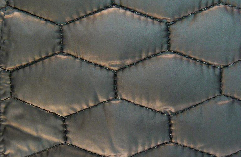 Down jacket sewn with continuous filament Serafil fine 180