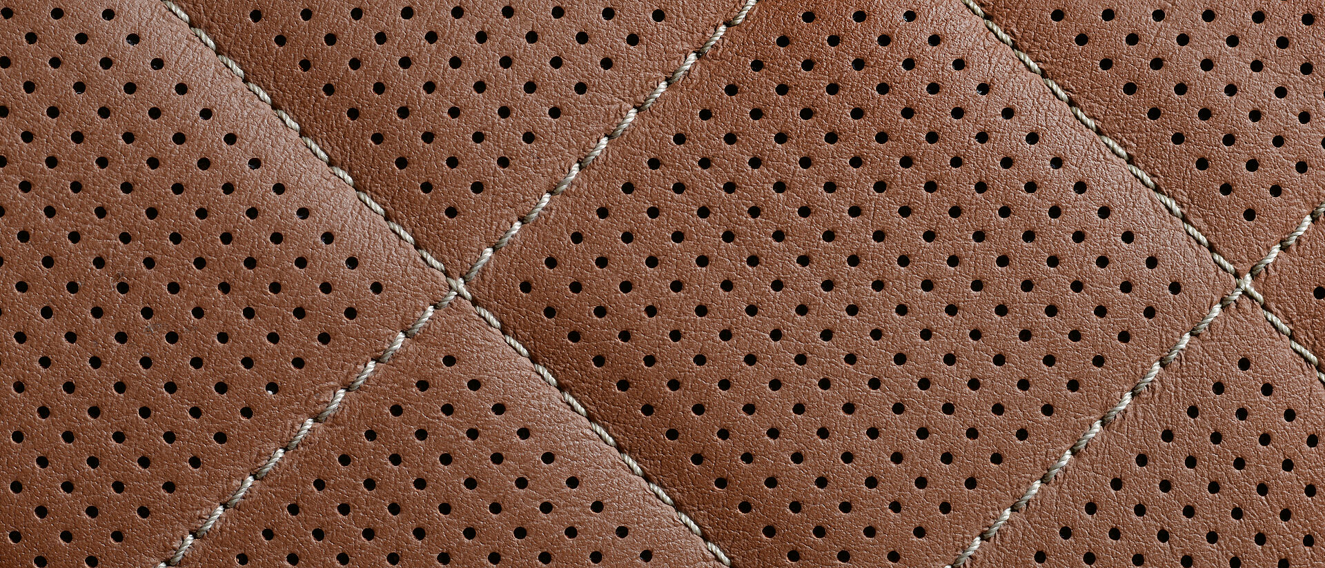 Diamond quilting on the centre panel of the seat